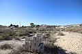 Two properties on a large plot prepared for 11 villas, in Baños de Fortuna, Murcia in Spanish Fincas