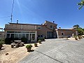 Gran Casa de Campo con negocio de mármol y plantación de uva in Spanish Fincas