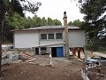 Gran casa rústica en un parque nacional con techo de pizarra. in Spanish Fincas