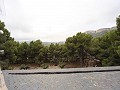 Gran casa rústica en un parque nacional con techo de pizarra. in Spanish Fincas