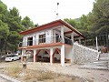 Gran casa rústica en un parque nacional con techo de pizarra. in Spanish Fincas