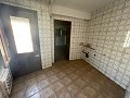 Casa adosada de 5 dormitorios y 2 baños que necesita reforma in Spanish Fincas