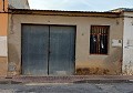 4 Car Garage with small Patio in Spanish Fincas